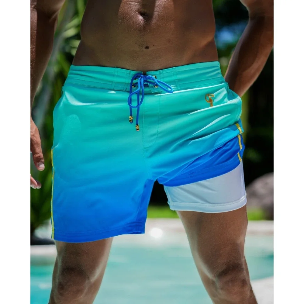 NEW Tucann Faded Ocean Swim Shorts Men Large 5 Inch Inseam Blue Teal Compression